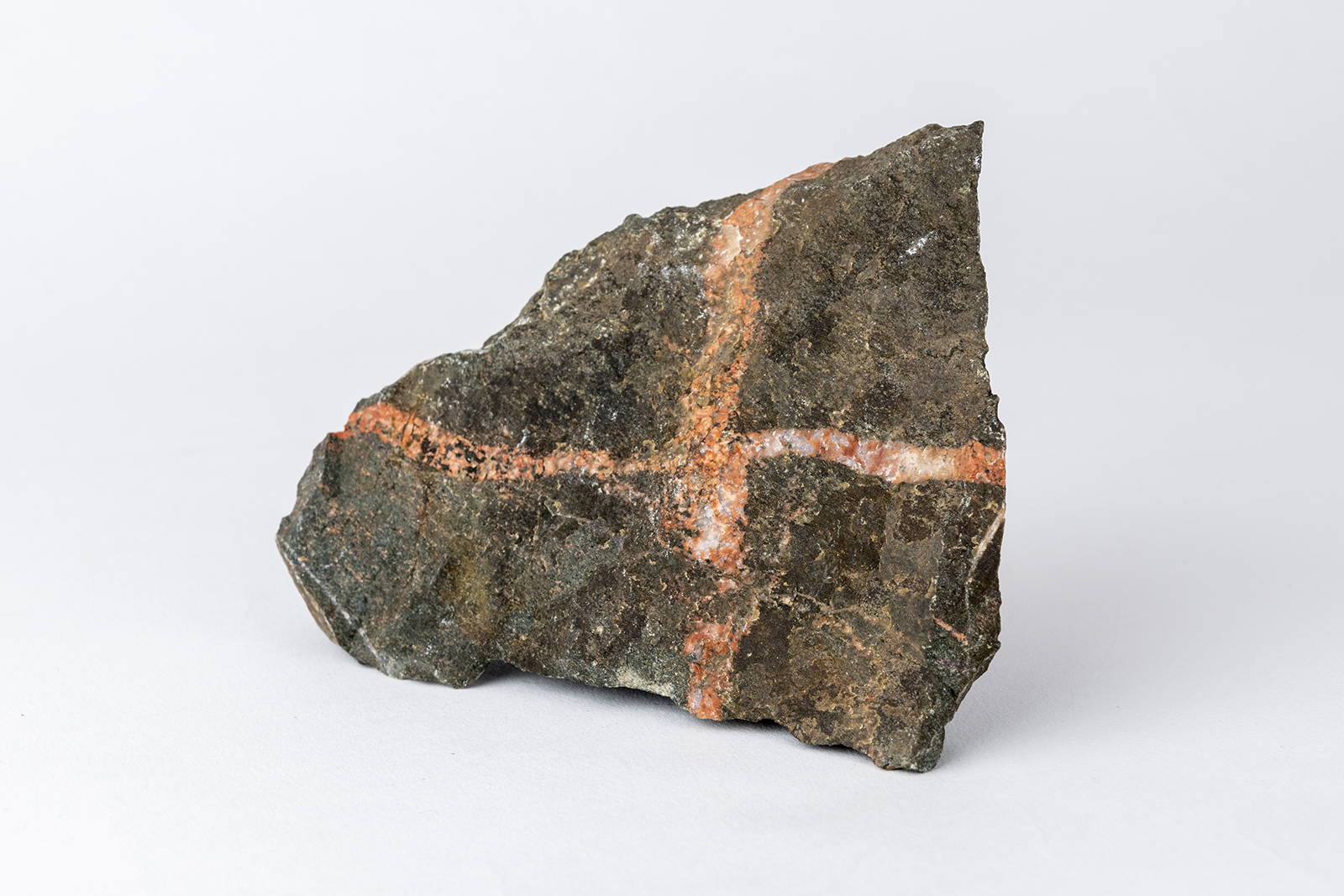 Pink granite veins cutting metamorphosed sandstone, Glen Tilt (GLAHM:106965)